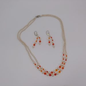 Collar en perlas con pendientes."ELEGANTES"